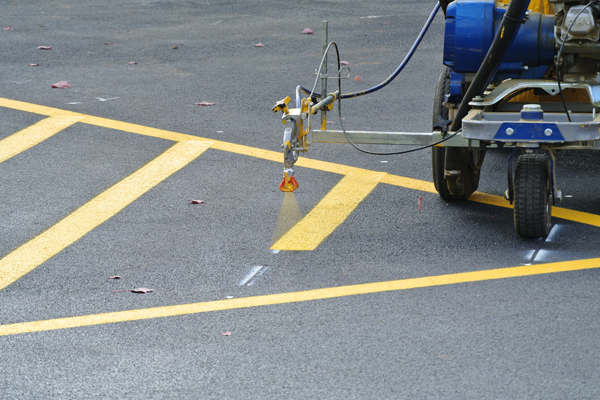 Line striping machine in action